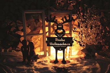 Elch mit Schild FROHE WEIHNACHTEN